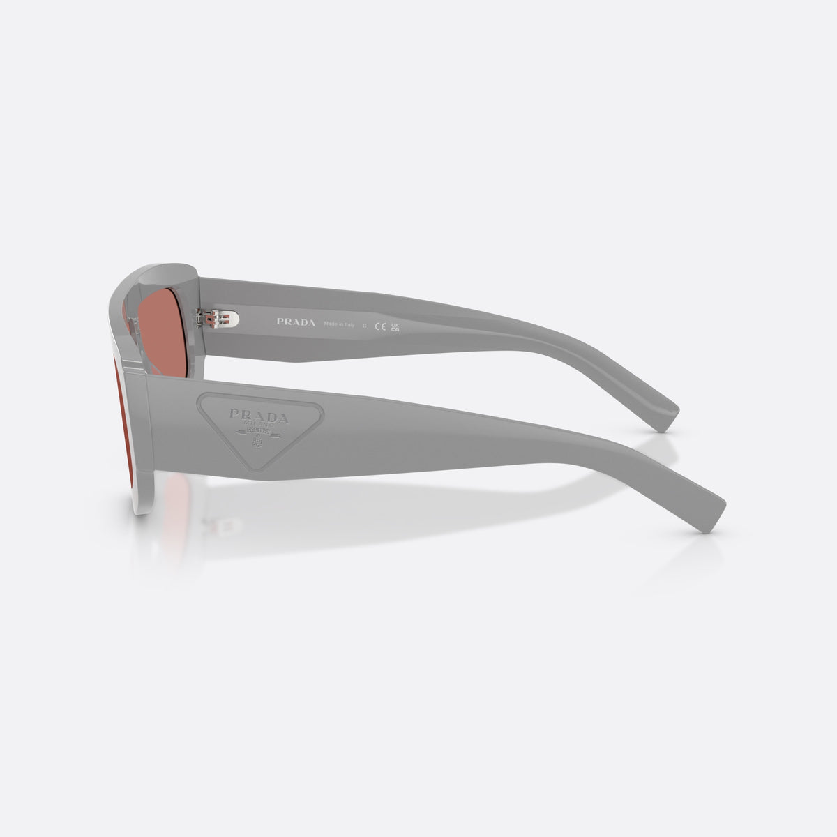 Prada PR D10S 29J80W sunglasses, grey irregular frame for men, integrated single bridge, brand lettering on lens, side view