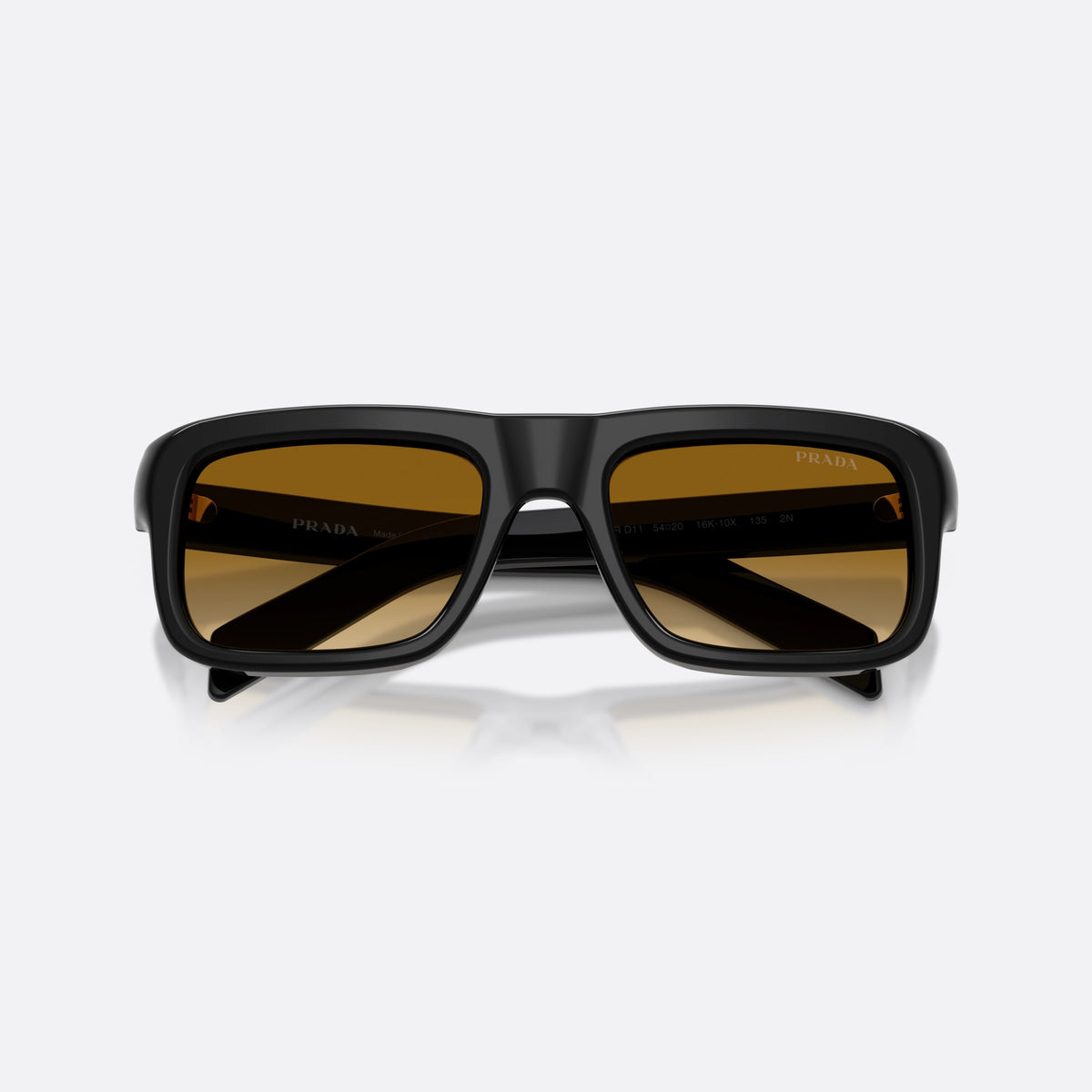 Prada PR D11S 16K10X sunglasses, black rectangle frame for men, plain bridge, brand lettering on temple, full-rim frame, folded