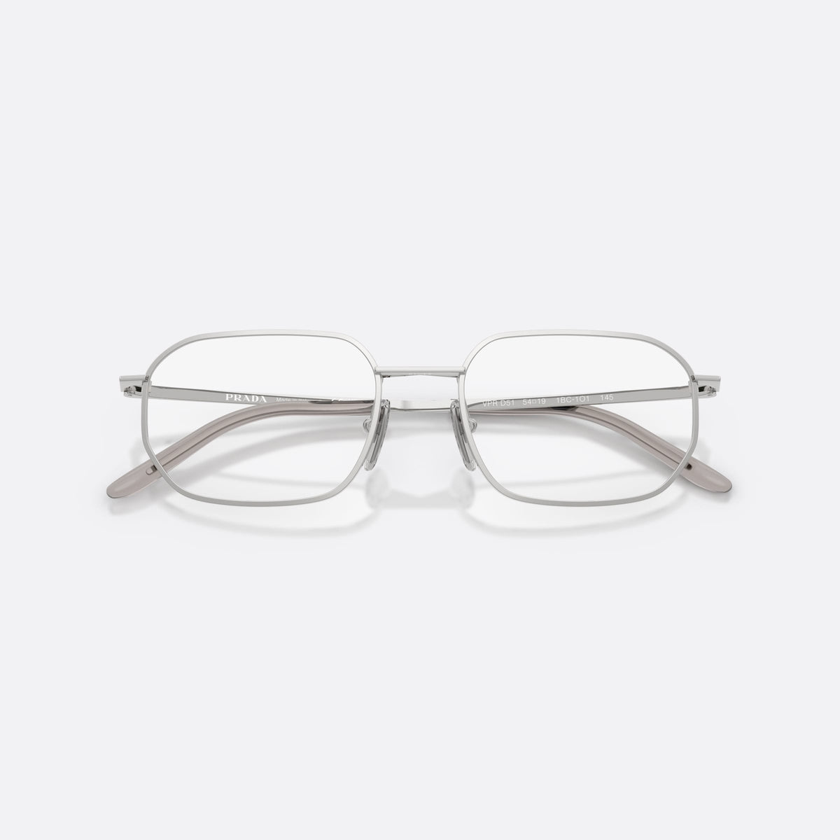 Prada PR D51V 1BC1O1 eyeglasses, silver irregular frame for men, plain metal bridge, brand lettering on temples, folded