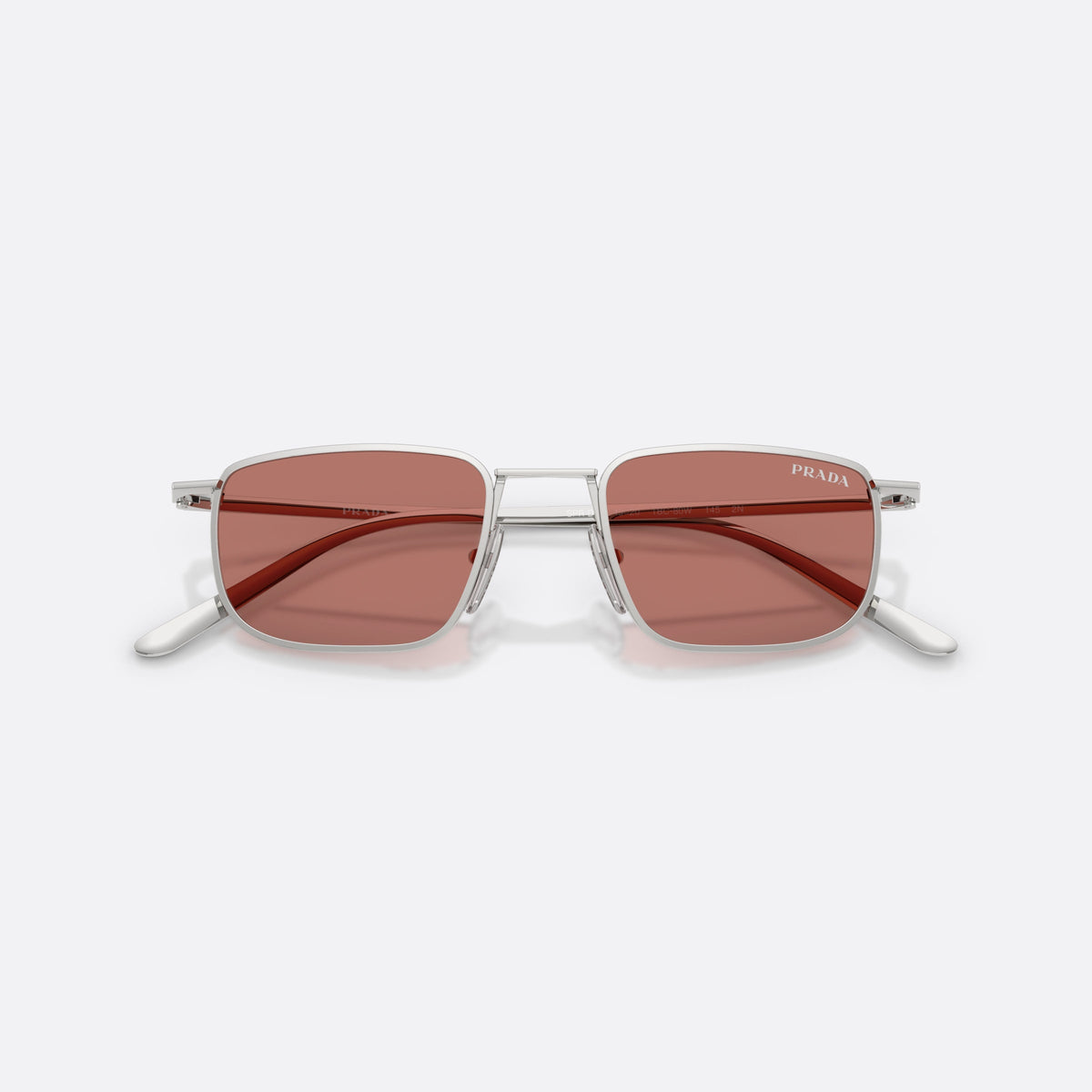 Prada PR D52S 1BC80W sunglasses, silver pillow frame for men, double bridge with metal connector, slim straight temples, folded