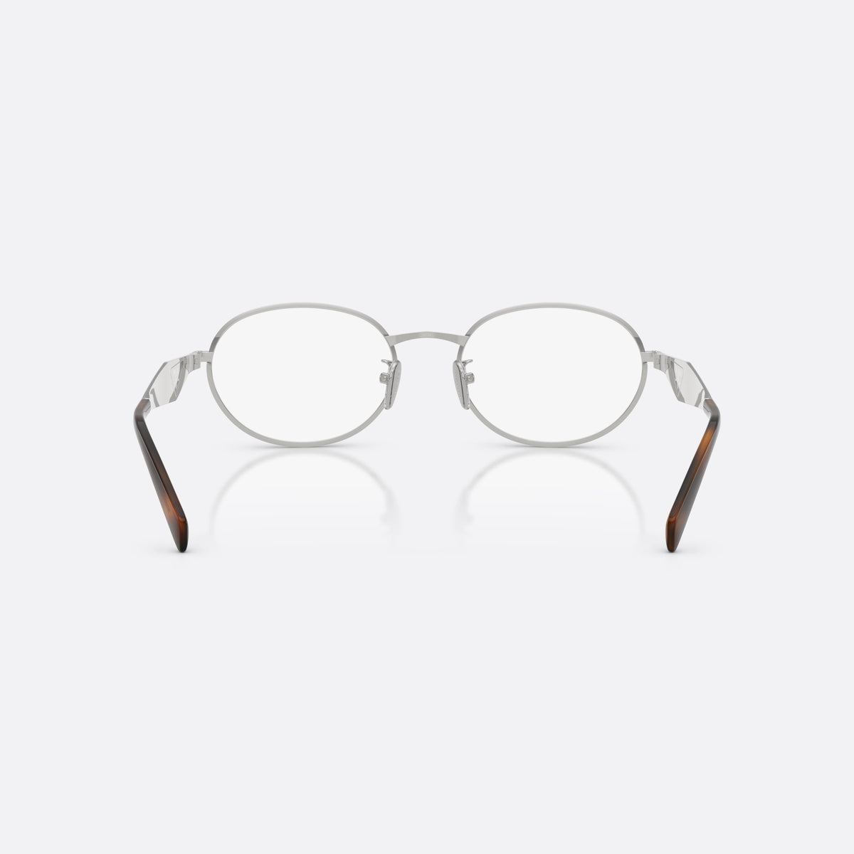 Prada PR D53VD 1BC1O1 eyeglasses, silver oval frame for women, plain metal bridge, brand logo plaque on temples, back view