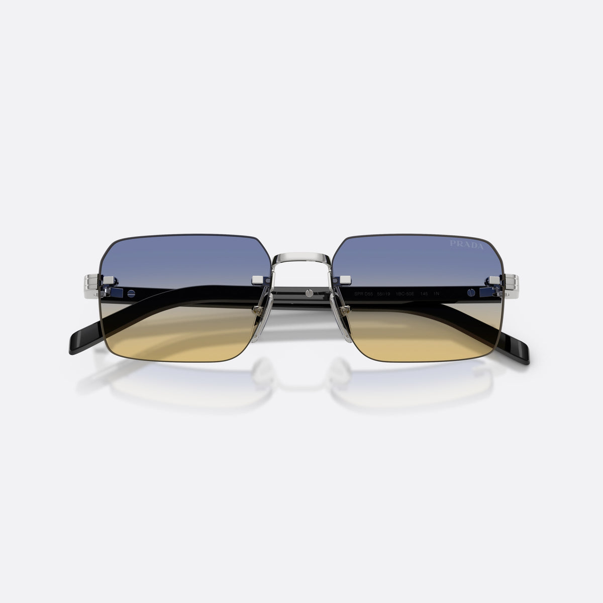 Prada PR D55S 1BC50E sunglasses, silver rectangle frame for men, plain metal bridge, brand lettering on temples, folded