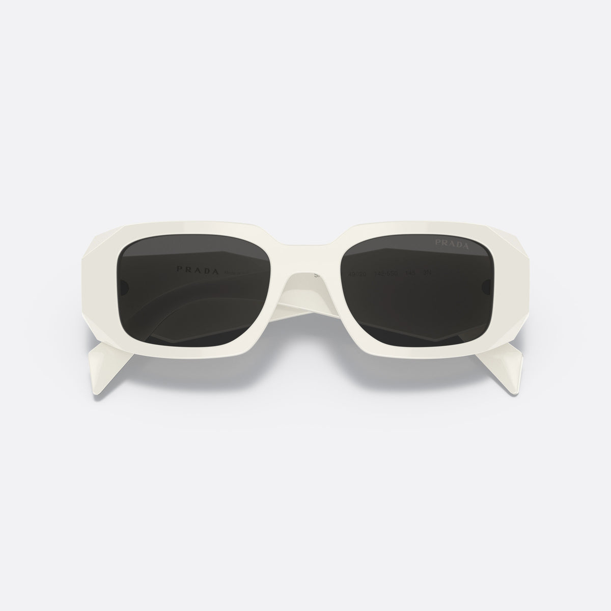 Prada Symbole PR 17WS 142-5S0 sunglasses, white geometric frame for women, plain bridge, brand lettering on temples, full-rim frame, folded